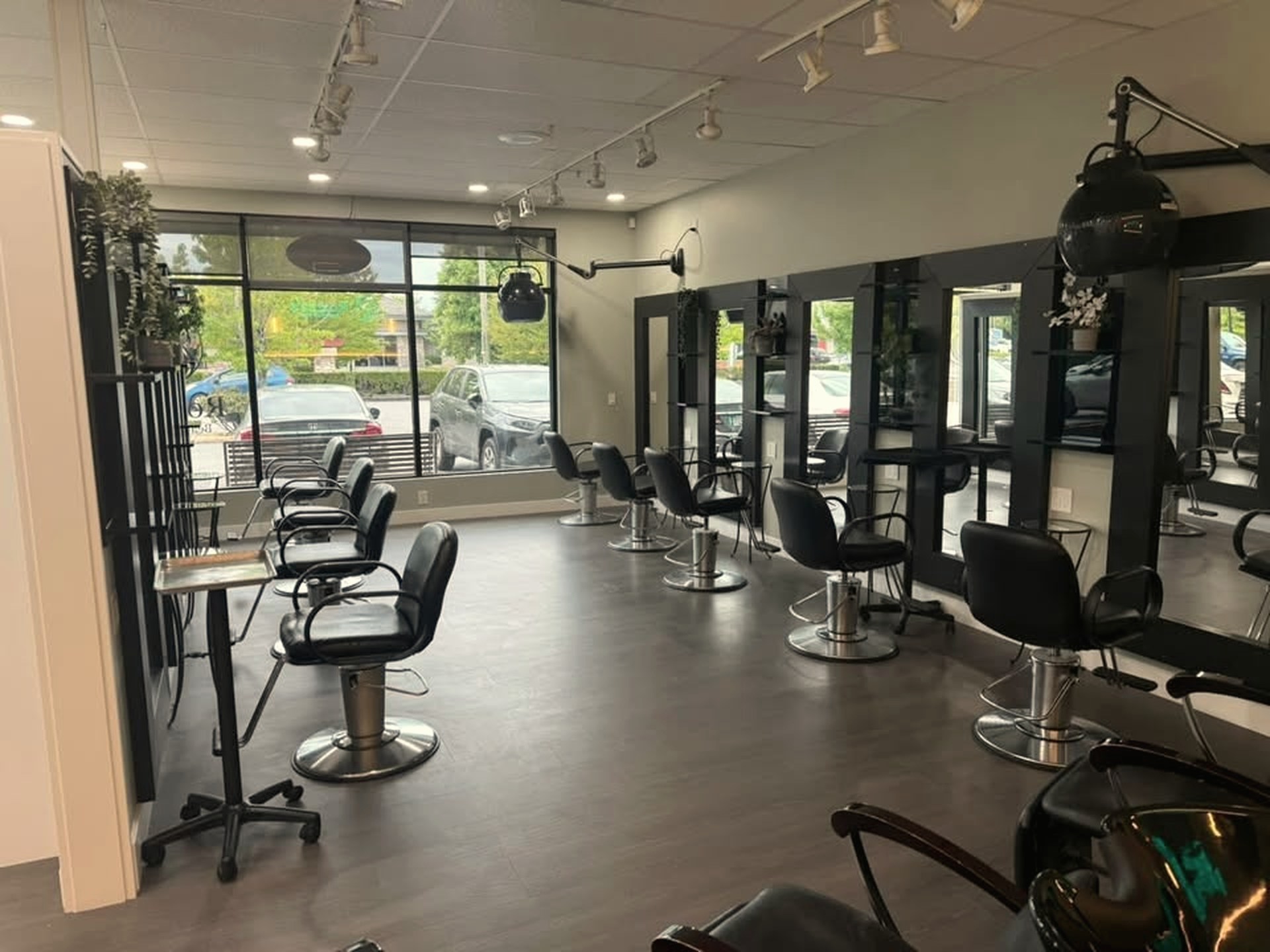 Hair styling stations with mirrors and natural light